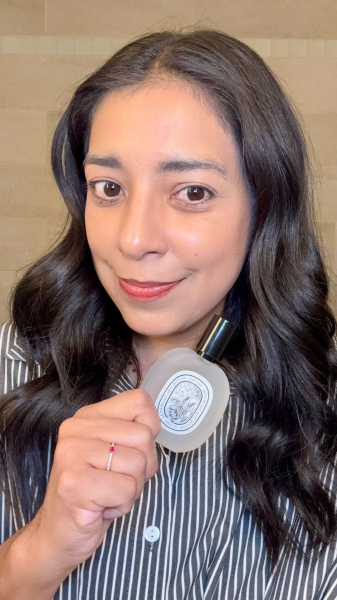 Allure managing editor Alessandra Foresto after applying the Diptyque Eau Rose Hair Mist