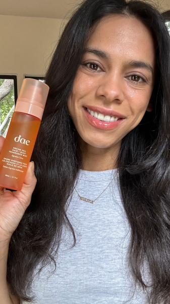 A selfie of Allure shopping director Shanna Shipin holding Dae Dream Veil Hair  Body Fragrance Mist