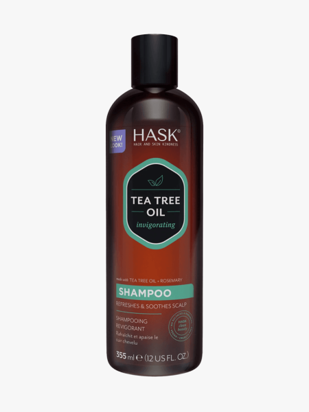 Hask Tea Tree Oil & Rosemary Invigorating Shampoo in branded bottle component on a light gray background