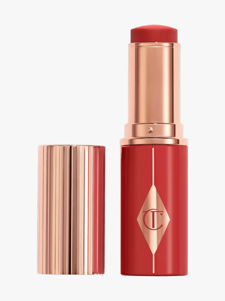 Charlotte Tilbury Unreal Blush Healthy Glow Stick in branded component on a light gray background