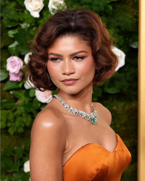 Zendaya with a chinlength warmtoned wavy Italian bob.