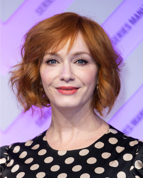 Loosely curled layered bob with sideangled fringe on Christina Hendricks.