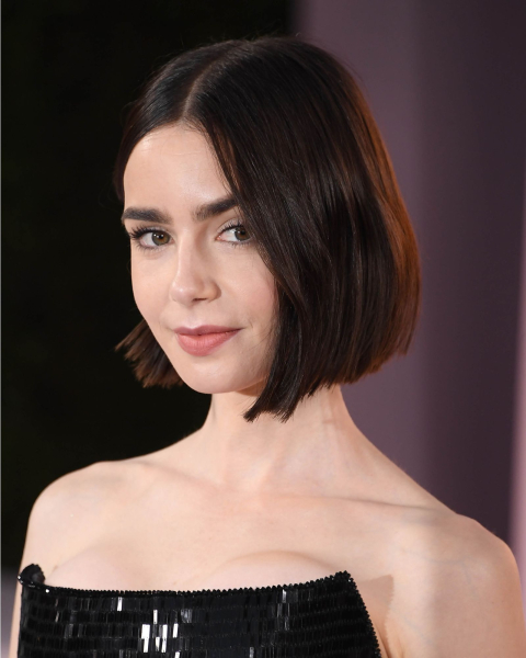 Lily Collins with an aline middlepart bob.